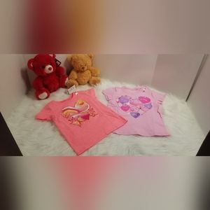 Two cute short sleeve with hearts they are both size xs